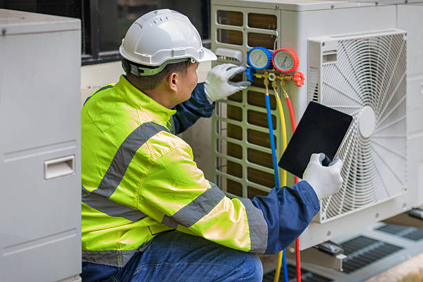Professional Heat Pump Repair technician working in Norway, IA